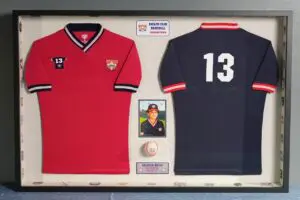 Cooperstown Dreams Park baseball jersey in shadow box display