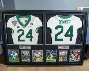 Custom framed green football jersey number 24 in shadow box