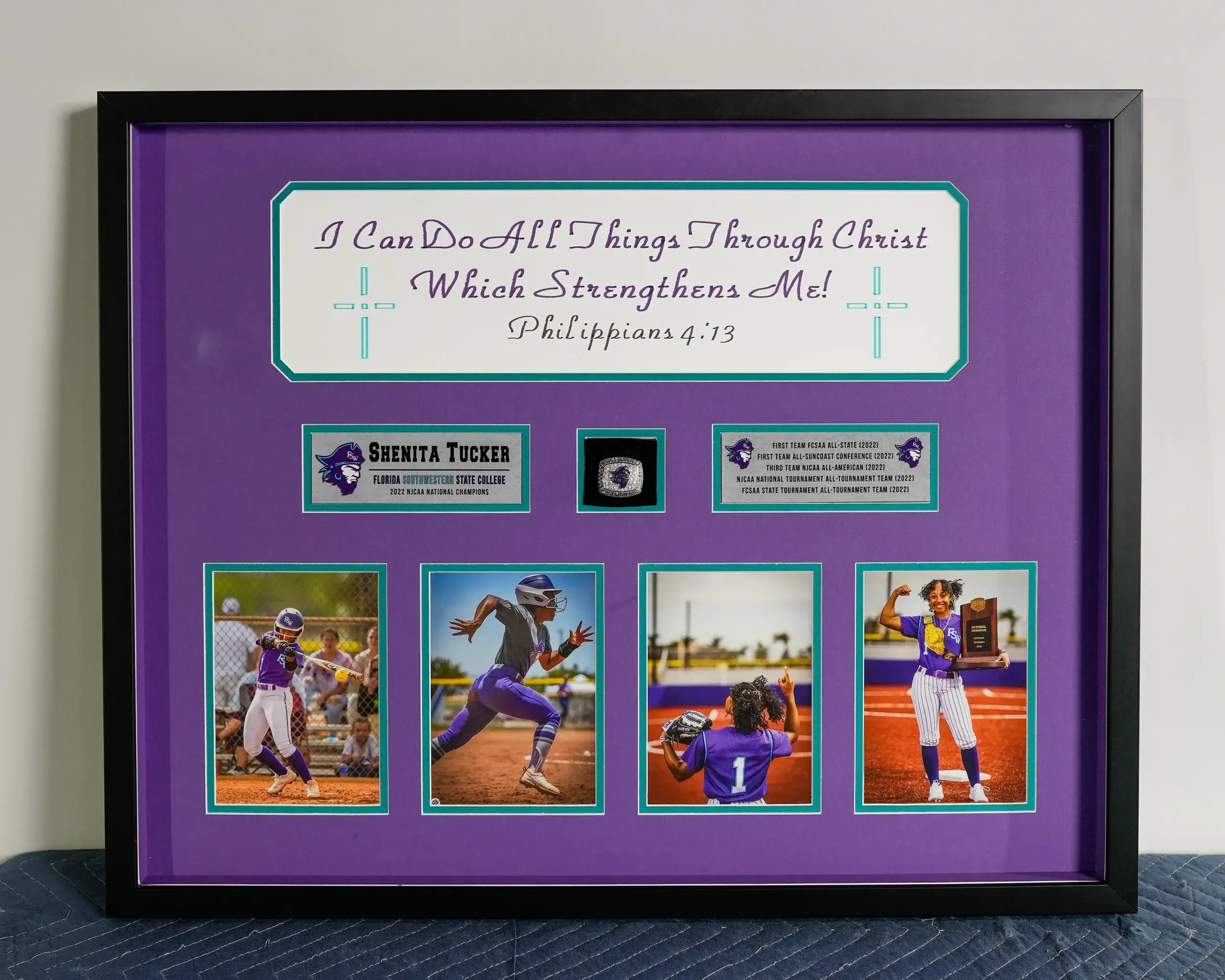A framed picture of baseball players and their names.