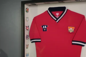 Red Cooperstown baseball jersey displayed in custom shadow box
