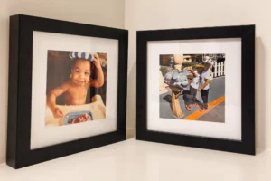 Framed family photo prints in black frame for modern home décor