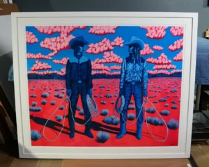 Framed modern art print featuring red and blue abstract design