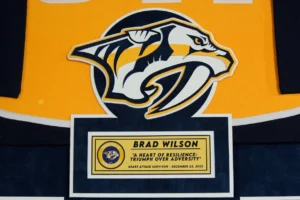 Custom Nashville tribute frame honoring Brad Wilson with photos and memorabilia